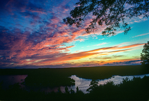 Lake of the Ozarks - Lake & Sunset Clouds 1991. Scanned from Kodachrome 64 slide.
