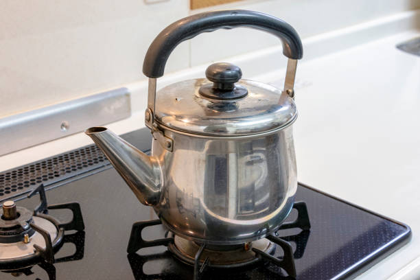 istock Gas stove and metal kettle 1270886003