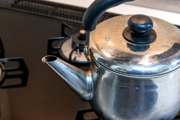 istock Gas stove and metal kettle 1270886019