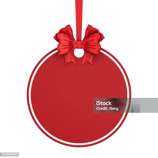 Round Christmas Label With Red Ribbon And Bow On White Background Isolated 3d Illustration Stock Photo - Download Image Now