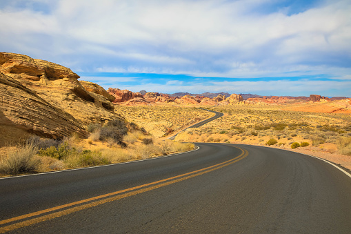 Travel destination Valley of Fire State Park in Nevada, USA with vivid orange landscape,