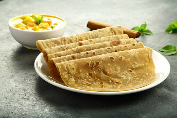 istock Plate of chapati and curry 1270892728