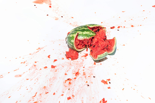 broken watermelon on white background.