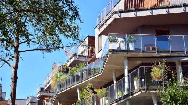istock New residential building, with beautiful architecture, which stands among the trees. 1270904765