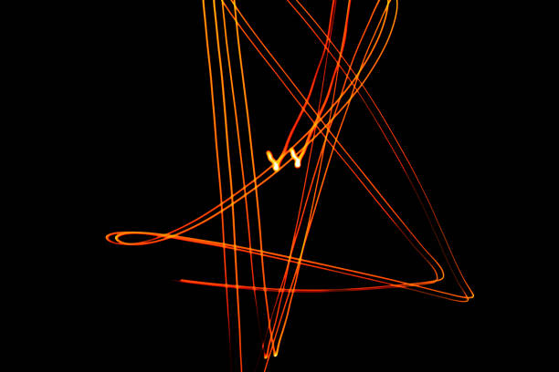 istock Creative conceptual fine art photography motion blur sparkle light trail on dark background copy space for text. Artistic design by lamp fire flame line at night slow shutter speed of camera exposure. 1270907099
