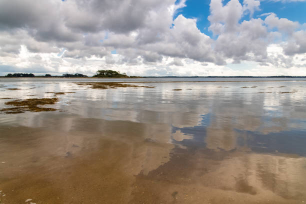 Brittany, panorama of the Morbihan gulf, view from the Ile aux Moines, with a beautiful sky