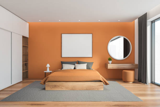 istock Orange bedroom interior with mirror and poster 1270910641