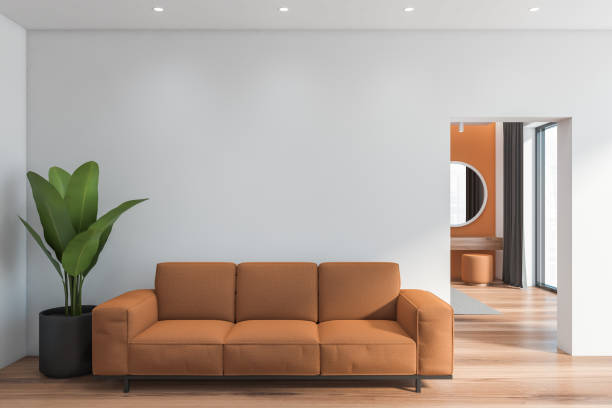 istock White living room interior with brown sofa 1270911246