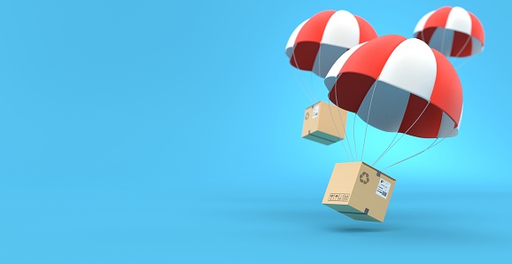 Cardboard boxes on parachute on blue background. 3d illustration