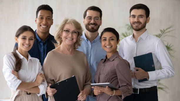 istock Happy diverse business people looking at camera. 1270913491