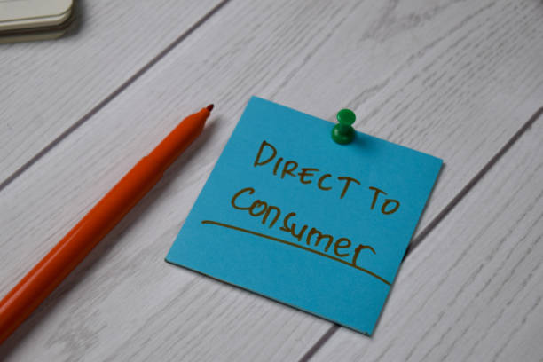 istock Direct To Consumer - DTC text on sticky notes isolated on office desk 1270916651