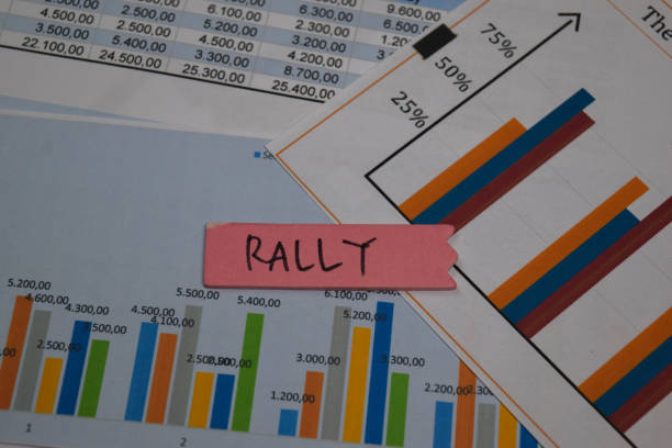 istock Rally write on sticky note isolated on wooden table. stock market concept 1270917567