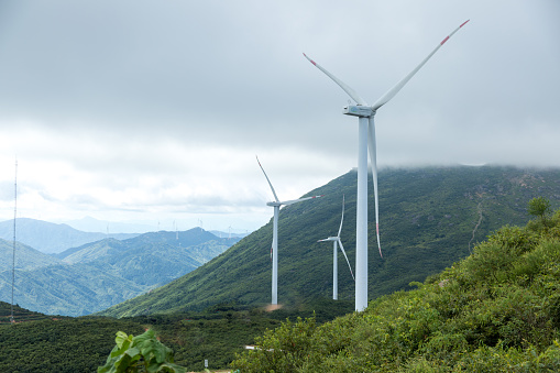 Wind Turbine in the sunset seen from an aerial view