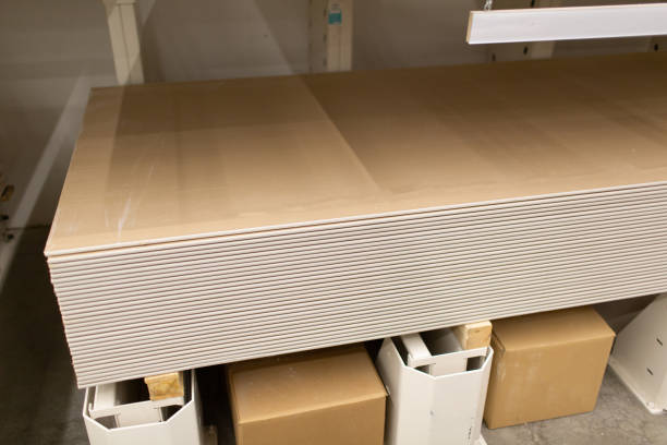 istock Pallet with Drywall sheets plasterboard in the building warehouse store. 1270922423