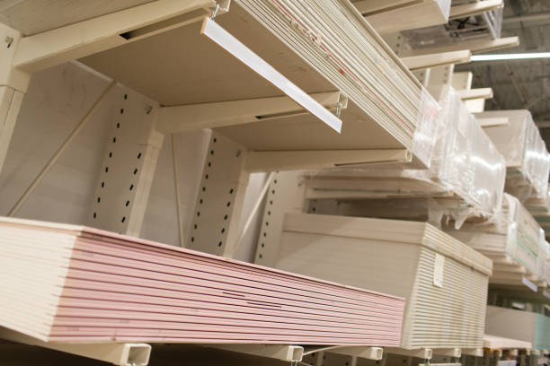 istock Pallet with Drywall sheets plasterboard in the building warehouse store. 1270922426