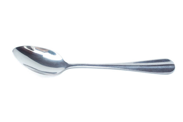istock Silver shiny spoon isolated on white background. Stainless cutlery spoon. Ready to use for design image. 1270923373