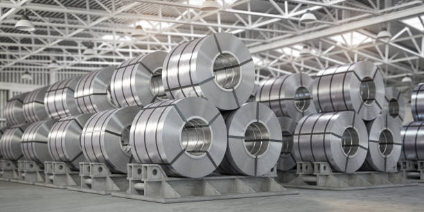rolls of metal sheet. zinc, aluminium or steel sheet rolls on warehouse in factory. - aço imagens e fotografias de stock