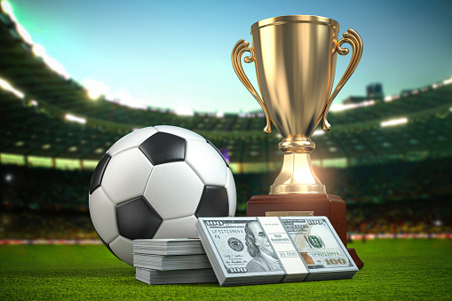 Betting, Footbal ball and cup with packs of dollar on football arena, 3d illustration