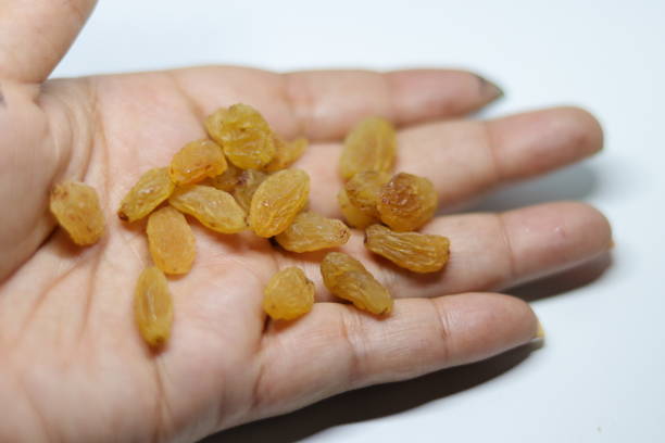 istock Yellow sultanas raisins isolated on white background cutout 1270924944