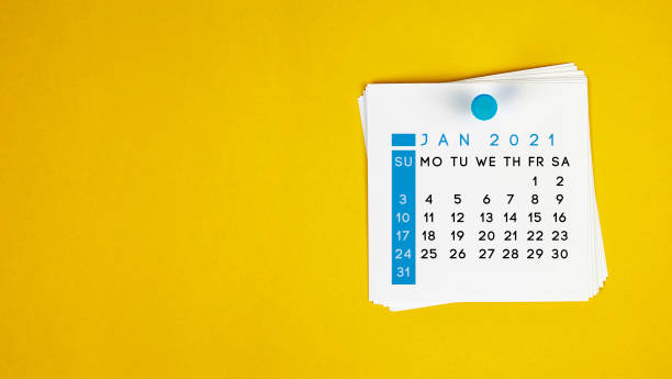 The January 2021 calendar is pinned on a yellow background.