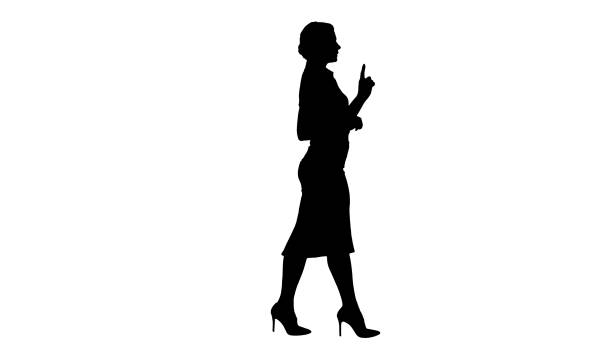 istock Silhouette Beautiful Woman Talking And Walking 1270929715