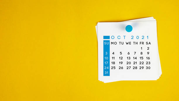 istock The October 2021 calendar is pinned on a yellow background. 1270929866