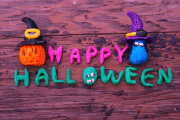 istock Figure of a pumpkin and a Ghost on a red background. 1270937140