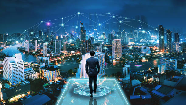 istock Business man on futuristic network city technology background 1270939616
