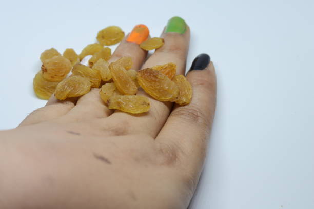 istock Yellow sultanas raisins isolated on white background cutout 1270940316