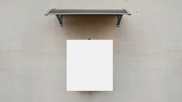istock white empty information poster hanging on concrete wall under street shelter 1270942456