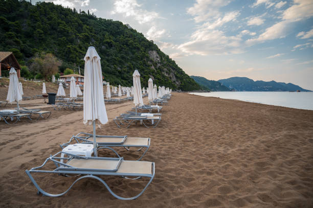 istock lounge chairs on the beach, Corfu, Greece 1270944050