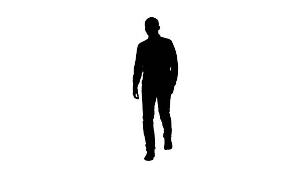 istock Silhouette Smiling young man is walking 1270946237