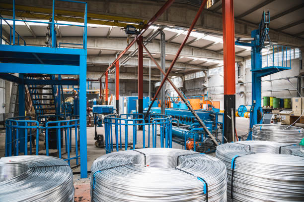Heavy Machinery and steel cable processing equipments at the empty manufacturing plant in the factory warehouse. XXXL size taken with Canon 5D Mark4