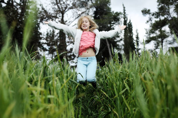 istock Girl enjoys freedom, summer, nature 1270951171