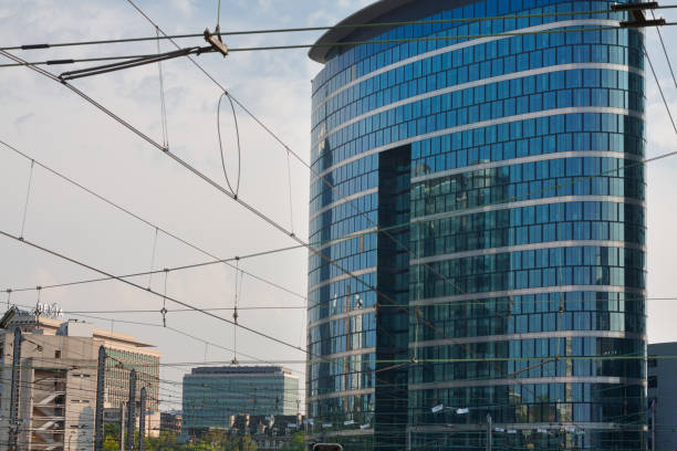 istock Modern office building and railway overhead cables in Brussels 1270953312