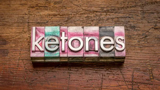 Photo of ketones word in gritty vintage letterpress metal type