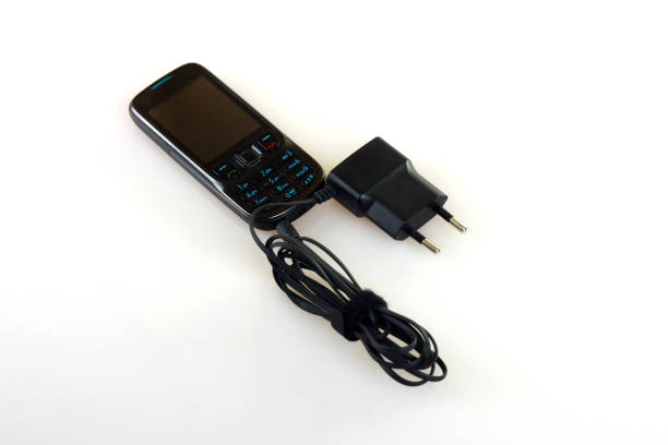 istock Old Mobile Phone and charger 1270958193