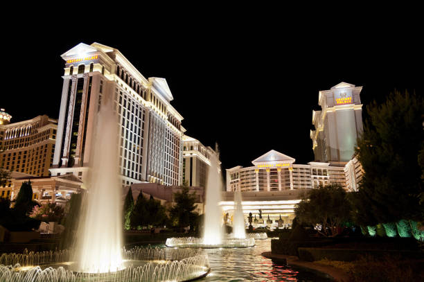 Las Vegas, US - March 28, 2018: The exterior front fountain of the famous Ceasars palace hotel in Las Vegas at dusk
