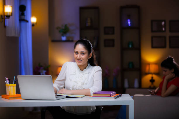 young student studying at home Indian, student, adult student, young student, teenage girls pretty smile looking at camera waist up stock pictures, royalty-free photos & images