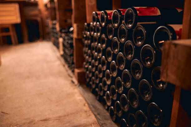 istock Bottles of wine stored in wine cellar 1270961668