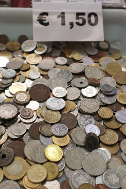 istock Different countries retro coins at flea market. 1270963259