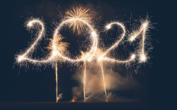 istock Sparkler Happy New Year 2021 With Fireworks 1270967996