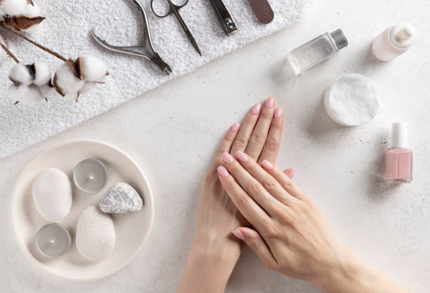 istock set of manicure tools and well-groomed female hands 1270968974