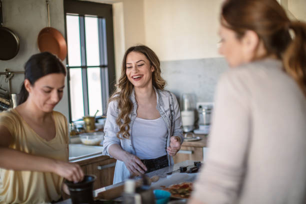 istock Group of friends preparing a pizza 1270969250