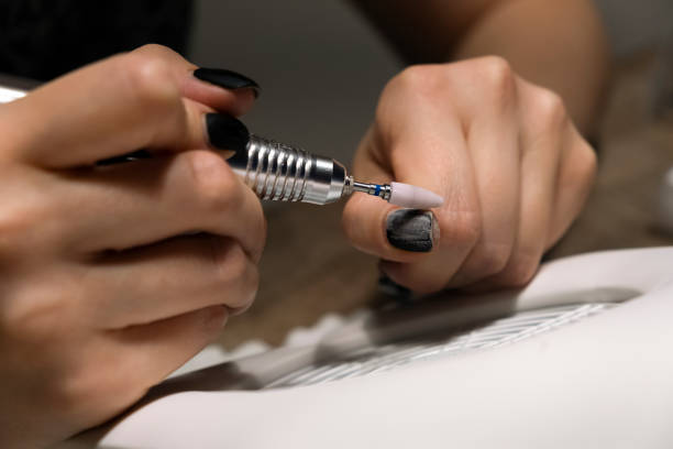 istock Removing gel polish at home using electric nail file drill 1270972253
