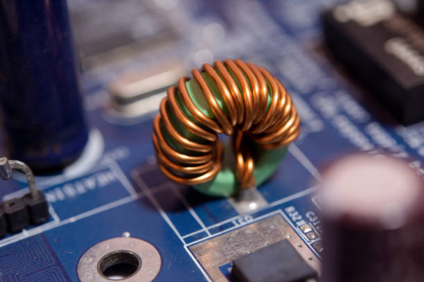 istock Close up Inductor electronic hardware technology on motherboard digital chip 1270974250