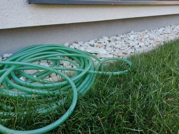 istock Garden hose near the house 1270975421