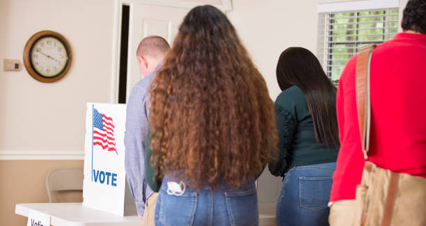 istock Voters at Polling Place 1270975567