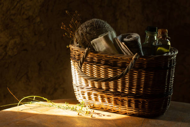 istock Linen cloth, threads in balls and dry flax plants in a basket 1270977525