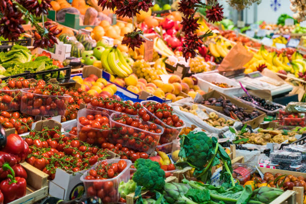 istock Colorful fruit and vegetable stand in local market. 1270977678